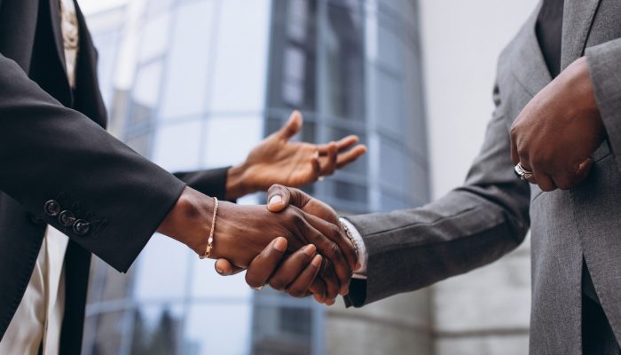 African business male people shaking hands